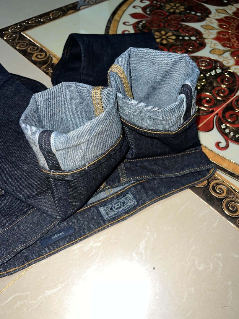 MODIFIED Raw Selvedge Denim Straight Jeans (Category: Jeans) located in Alegria. Submitted by goofy_ripper (Listing ID 1470079740, Image 2). Description: - Brand: Tobiten - Condition: Brand new with original tags attached (unworn) - Style: Straight cut, dark indigo wash - Fabric: Heavyweight with crisp structure - Details: Contrast yellow stitching, back leather patch, branded pocket tag - Selvedge ID: Clean cuffs with redline detail.