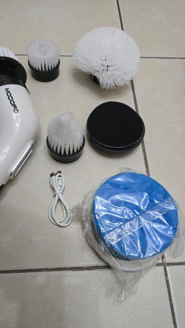 MODOFO 8 in 1 Multifunctional Electric Cleaning Brush (Category: Cleaning Tools & Supplies) located in Quezon City. Submitted by johnraenicol1403745 (Listing ID 1470001081, Image 3). Description: - Brand: MODOFO 8-in-1 electric cleaning brush set - Price: 650 - Location: Santolan, Pasig City - Color: Black and white - Condition: Brand new, never used, all parts still wrapped inside with original box - Inclusions: Main scrubber unit, extendable me