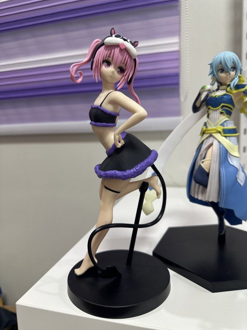 Momo Belia Deviluke Anime Figure To Love Ru (Category: Figurines & Statues) located in Manila. Submitted by silentfire.54ea36 (Listing ID 1470117317, Image 1). Description: - Character: Momo Belia Deviluke from To Love Ru - Design: Pink hair, black and purple outfit, animal ear hoodie, and wraparound demonic tail - Inclusions: Sturdy black round base - Perfect addition to any anime figure collection.