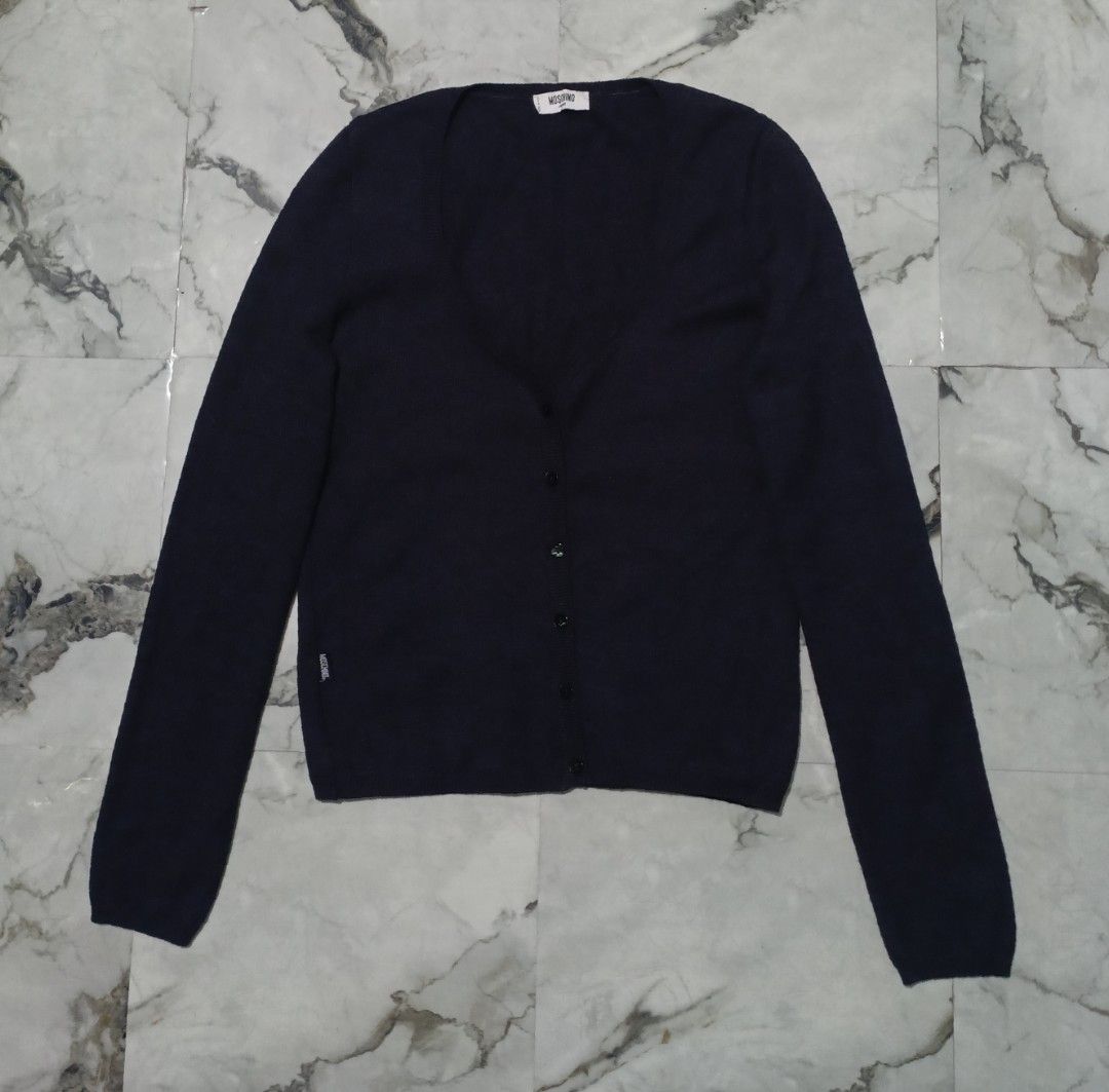 Moschino Cardigan (Category: Luxury Apparel) located in Bacolod City. Submitted by luxtrend.ph (Listing ID 1469952022, Image 2). Description: Moschino Cardigan M0SH!NO CARDIGAN •Photos may vary due to lighting✨ •For Women •Size: Small to Medium •Measurements: 17 - 19 W / 23 L •Condition: Excellent •Issues: None •Color Rate: 9.5/10 •Complete tags •Stretchable fabric material •₱rice: 1,880🏷 DM to purchase🛒🛒🛒 Courier: J&T Express MOP: Gcash / Ba