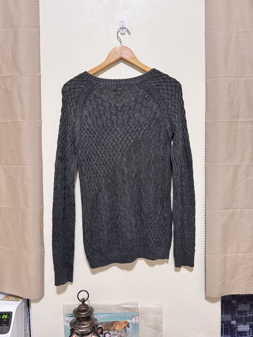 Mossimo Dark Grey Knit Sweater Medium (Category: Longsleeves) located in Manila. Submitted by seayouncey (Listing ID 1470044914, Image 2). Description: - Brand: Mossimo - Color: Dark grey - Size: Medium (tag attached) - Material & Design: Textured cable knit pattern throughout body and sleeves - Details: Scoop neckline, long sleeves with ribbed cuffs and hem - Style: Classic layering piece for autumn and winter - Condition: Great pre-loved condit