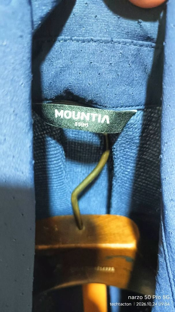 Mountia Navy Blue Short Sleeve Shirt (Category: Shirts) located in Santo Tomas. Submitted by pickers_corner (Listing ID 1469999419, Image 3). Description: MOUNTIA Trecking polo quick dry stretch fabric size M dime 20x27 excellent condition - Brand/Item: Mountia Dark Blue Short Sleeve Button-Up Shirt - Size: 095 (Medium) - Material & Fabric: Lightweight polyester blend with a textured pattern and small ventilation holes for maximum breathability -