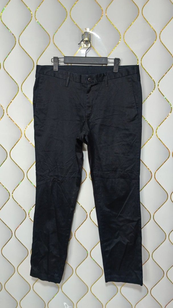Muji Black Casual Pants (Category: Trousers) located in Manila. Submitted by zariyah.1986 (Listing ID 1469964545, Image 1). Description: - Brand/Style: Muji Black Casual Pants - Material: 98% cotton, 2% spandex (with stretch) - Size: (85cm inseam)(34×38) - Features: Standard button closure, zip fly, and functional back pockets - Condition/Design: Solid black basic, versatile for work or daily casual wear.