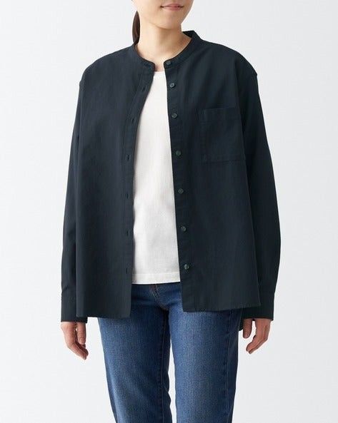 MUJI stand collar shirt (XL) (Category: Shirts) located in Baguio. Submitted by sky_alexander143 (Listing ID 1469975699, Image 2). Description: - Color: Dark navy / Deep blue - Material: 100% comfortable cotton - Design: Modern band collar with front button placket - Details: Single left chest pocket and long sleeves with buttoned cuffs - Fit: Classic straight hem, great for solo wear or layering.