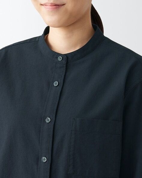 MUJI stand collar shirt (XL) (Category: Shirts) located in Baguio. Submitted by sky_alexander143 (Listing ID 1469975699, Image 1). Description: - Color: Dark navy / Deep blue - Material: 100% comfortable cotton - Design: Modern band collar with front button placket - Details: Single left chest pocket and long sleeves with buttoned cuffs - Fit: Classic straight hem, great for solo wear or layering.