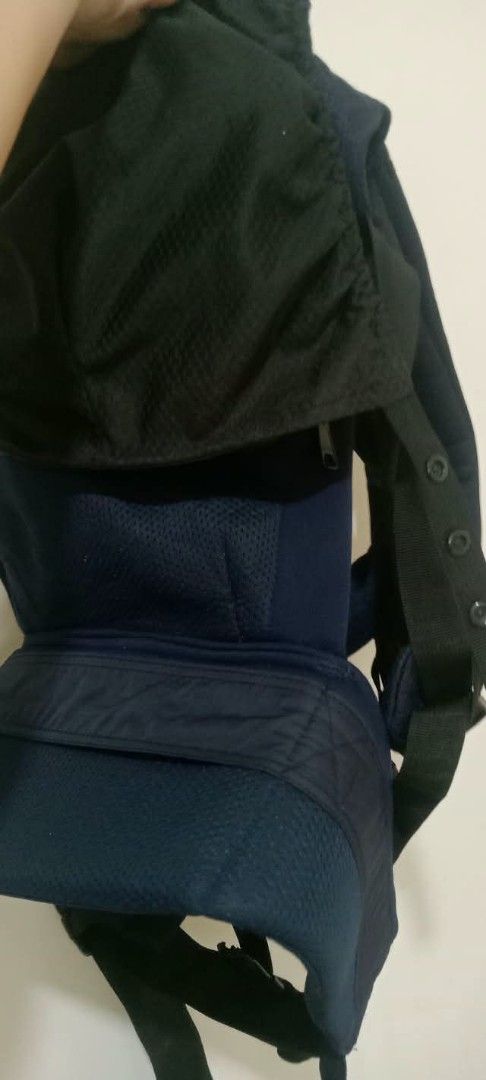 Napnap Baby Carrier Blue (Category: Carriers & Slings) located in Gapan. Submitted by montesnora80204 (Listing ID 1470046280, Image 2). Description: - Brand: Napnap - Color: Navy Blue - Breathable mesh fabric keeps you and baby cool and comfortable - Adjustable straps and padded waist belt for superior ergonomic support - Convenient front storage pocket with zipper for small essentials - Attached black hood provides great sun and wind coverage - 