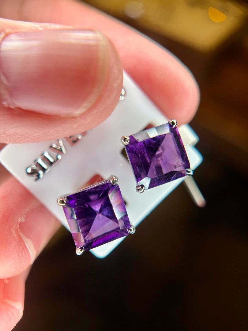 NATURAL AMETHYST STUD EARRINGS (Category: Earrings) located in Baguio. Submitted by asna_taku (Listing ID 1470061893, Image 2). Description: 💜 NATURAL AMETHYST STUD EARRINGS — THE COLOR OF ROYALTY 👑 Regal purple, timeless elegance! ✨ These brand-new Natural Amethyst studs feature a beautiful square princess-style step cut, showcasing the rich violet hues of this captivating gemstone. 💜 Natural Amethyst ✨ Square step-cut faceted stones 🥈 925 S