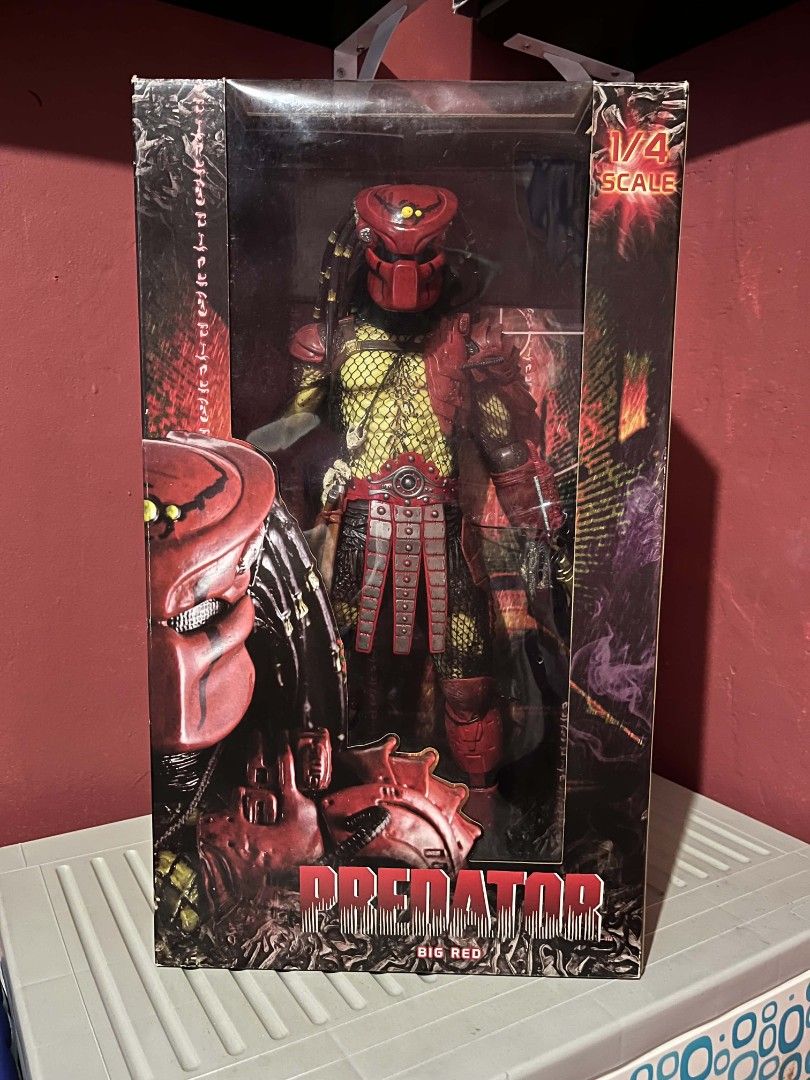 NECA Predator Big Red 1/4 Scale Action Figure (Category: Figurines & Statues) located in Manila. Submitted by paulaure1282163 (Listing ID 1470083977, Image 1). Description: - Item: Big Red Predator Action Figure - Scale: 1/4 Scale Large Collectible - Features: Iconic red mask, highly detailed armor, signature dreadlocks, and fishnet bodysuit - Packaging: Original box included with clear front window display (shows standard shelf wear) - Ideal For