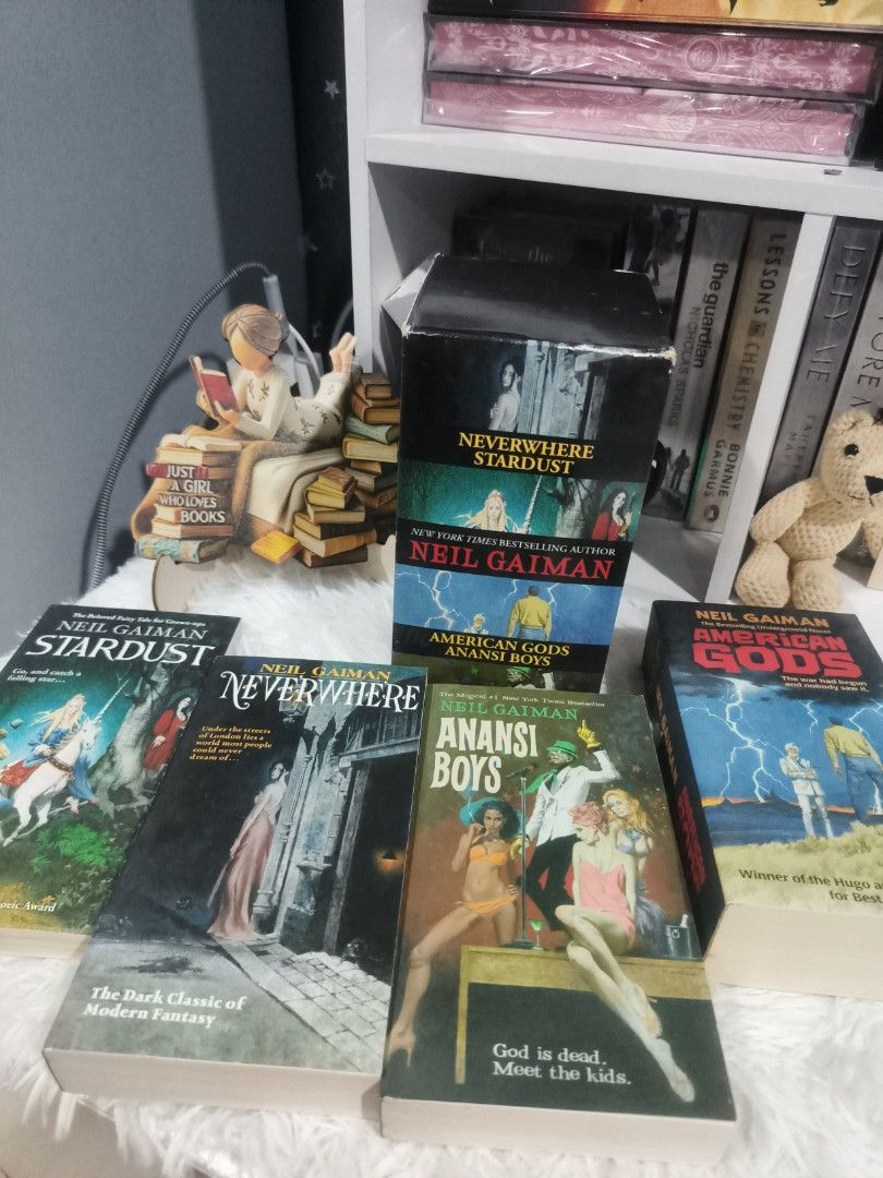 Neil Gaiman 4-Book Box Set Morrow Fiction (Category: Storybooks) located in Cabuyao City. Submitted by chaptersandwonders143 (Listing ID 1469995838, Image 1). Description: - Complete 4-book Neil Gaiman paperback box set: Neverwhere, Stardust, American Gods, and Anansi Boys - Stunning retro-style full-color covers by renowned artist Robert McGinnis - Includes original illustrated slipcase box - Book condition: Clean pages and uncreased spines (lik