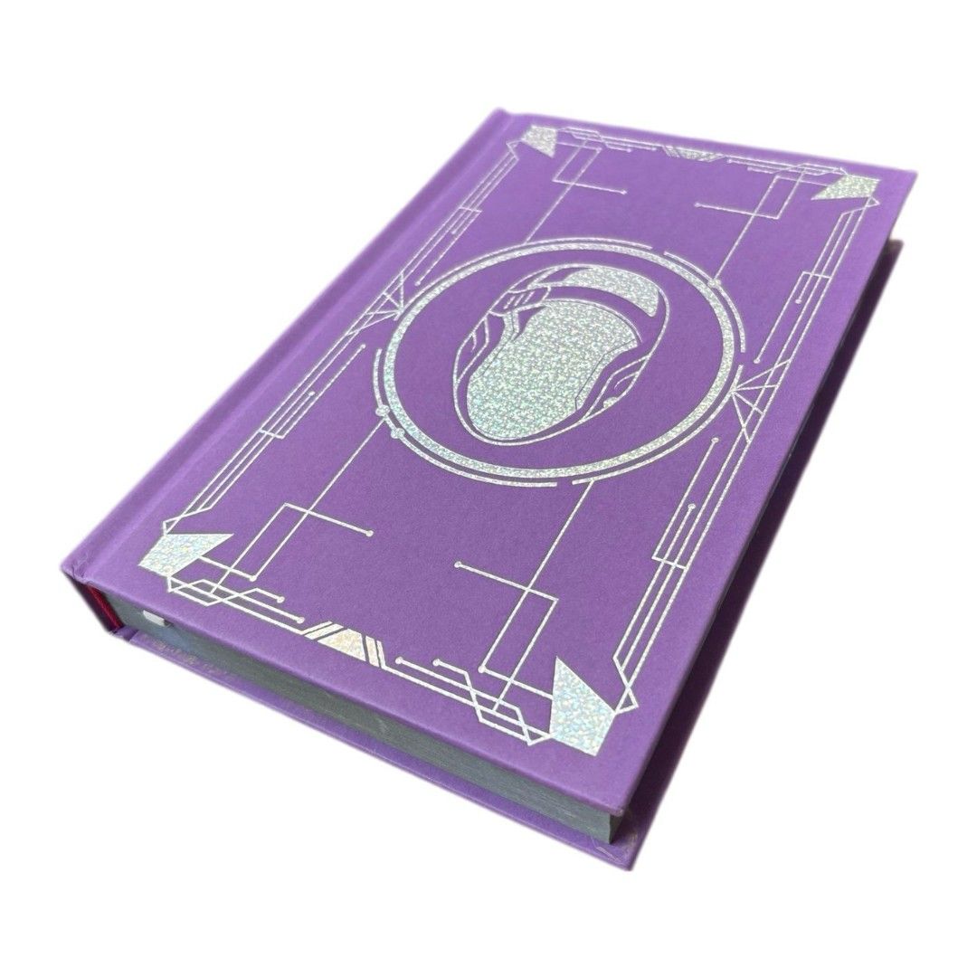 Network Effect Martha Wells Murderbot Novel Special Edition (Category: Storybooks) located in Virac. Submitted by ccarlll (Listing ID 1470128690, Image 2). Description: - Title: Network Effect by Martha Wells (The Murderbot Diaries series) - Edition: Special hardcover collector's edition - Design: Purple cloth cover with silver foil geometric details and front helmet emblem - Details: Custom printed page edges with character artwork - Condition: 