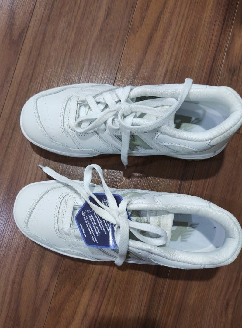 New Balance 550 White Sage Green (Category: Sneakers) located in Quezon City. Submitted by jhays02 (Listing ID 1470028084, Image 3). Description: - Brand new with green tag still attached - Model: New Balance 550 - Colorway: White with stylish sage green accents - Classic retro court design with perforated leather upper - Signature 'N' logo branding on the side - Equipped with OrthoLite comfort foam insoles for all-day wear - Crisp white midsoles