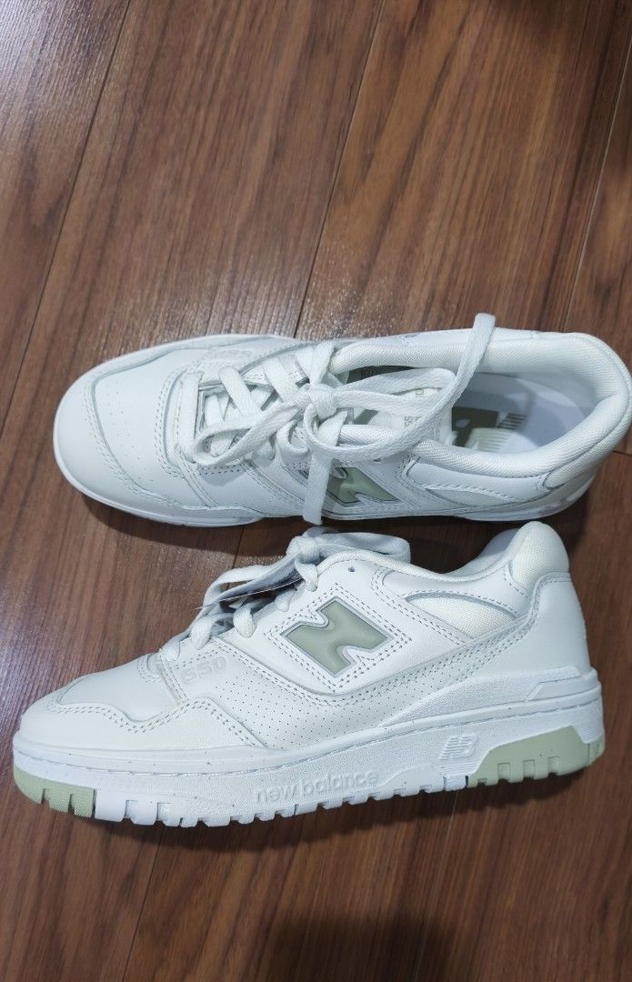 New Balance 550 White Sage Green (Category: Sneakers) located in Quezon City. Submitted by jhays02 (Listing ID 1470028084, Image 2). Description: - Brand new with green tag still attached - Model: New Balance 550 - Colorway: White with stylish sage green accents - Classic retro court design with perforated leather upper - Signature 'N' logo branding on the side - Equipped with OrthoLite comfort foam insoles for all-day wear - Crisp white midsoles