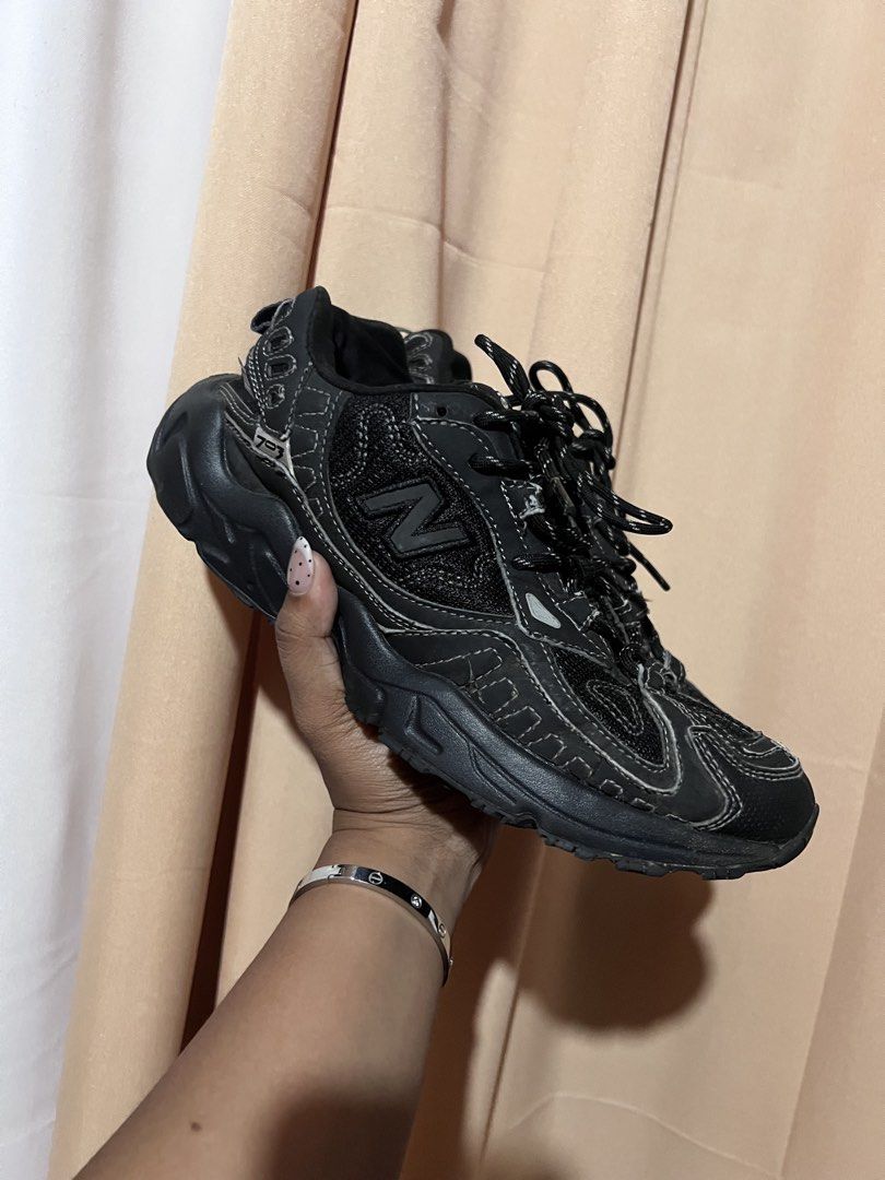 New Balance 703 Black Sneakers (Category: Sneakers) located in Kidapawan. Submitted by frizzyjayne (Listing ID 1470059606, Image 1). Description: - Brand: New Balance - Model: 703 - Color: Black with grey contrast stitching - Features: Chunky soles, breathable mesh panels, iconic 'N' logo, and sturdy black laces - Condition: Brand New - Perfect for: Great everyday rotation pair - Location: Philippines (Shipping available) -SIZE US 8 UK 7.5 EU 41.