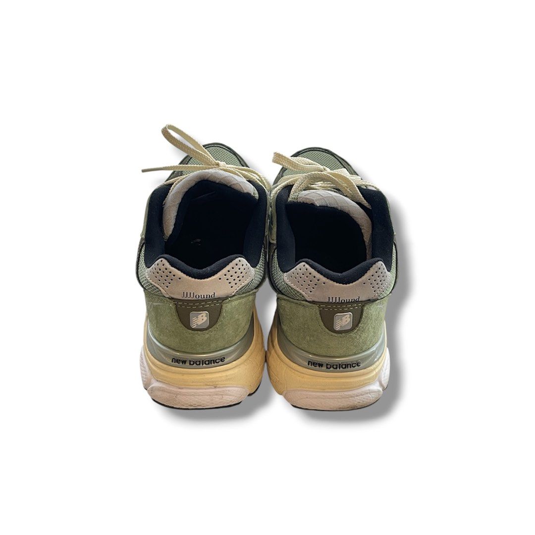 New Balance 990 V3 (Category: Sneakers) located in Manila. Submitted by jstash09 (Listing ID 1469952715, Image 3). Description: - Colorway: Olive green with black branding and cream accents - Materials: Premium suede and mesh upper - Details: Cream laces, dual branding on heel tab with JJJJound text, cream/white midsole, and black rubber outsole - Condition: Moderate dirt on the outsole from wear - Style: Classic running silhouette, highly sought