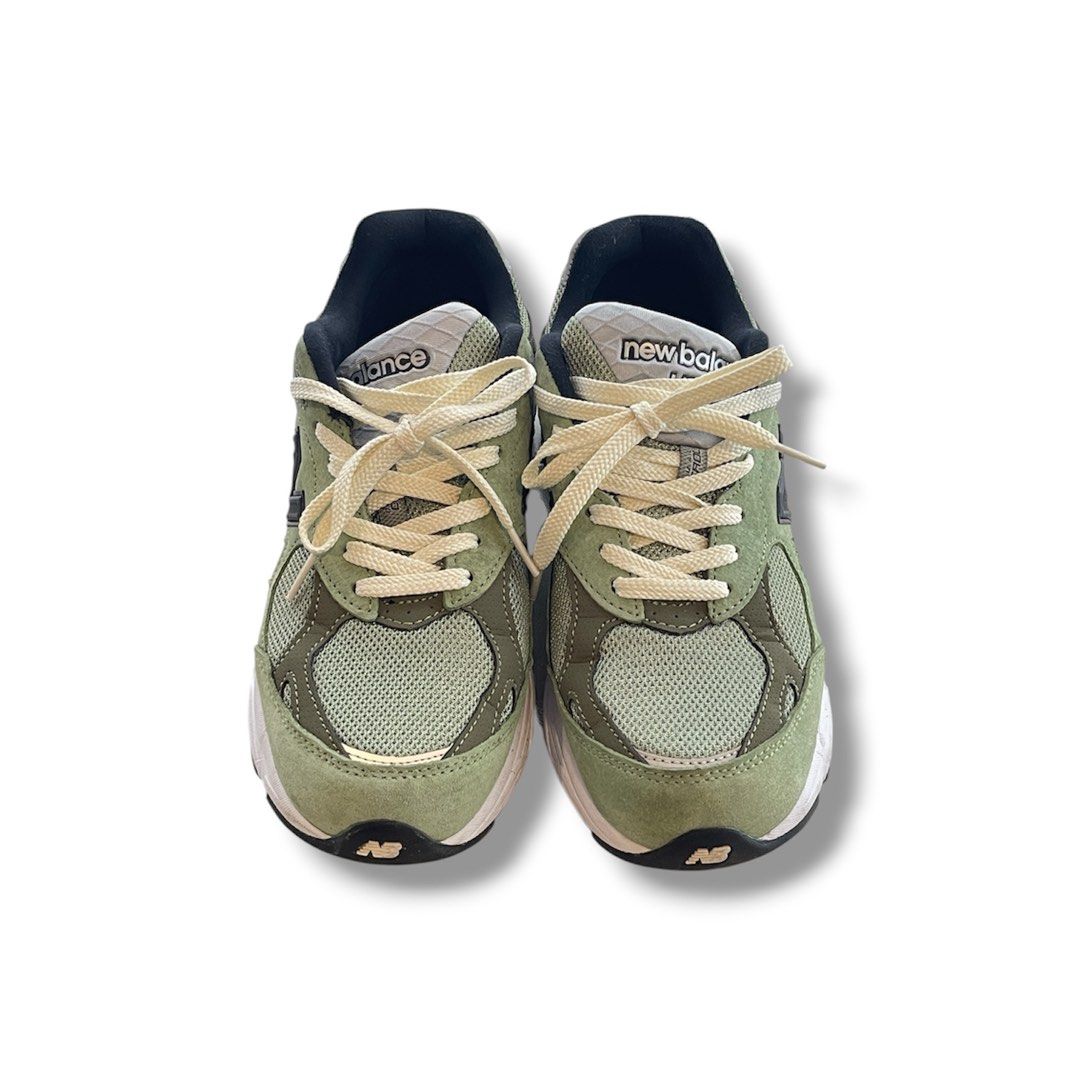 New Balance 990 V3 (Category: Sneakers) located in Manila. Submitted by jstash09 (Listing ID 1469952715, Image 2). Description: - Colorway: Olive green with black branding and cream accents - Materials: Premium suede and mesh upper - Details: Cream laces, dual branding on heel tab with JJJJound text, cream/white midsole, and black rubber outsole - Condition: Moderate dirt on the outsole from wear - Style: Classic running silhouette, highly sought