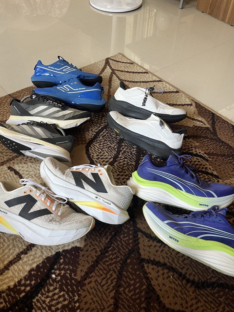 New Balance FuelCell SuperComp Carbon Plated (Category: Sneakers) located in Iligan City. Submitted by nick.segualan (Listing ID 1470047636, Image 2). Description: - Brand/Model: New Balance FuelCell SuperComp Trainer - Size: 11.5 US / 28.5 cm (2E Wide fit) - Colorway: Cream white upper with black branding and orange-yellow gradient midsole - Condition: Worn a few times, minimal outsole wear - Features: High stack height, incredibly bouncy foam f