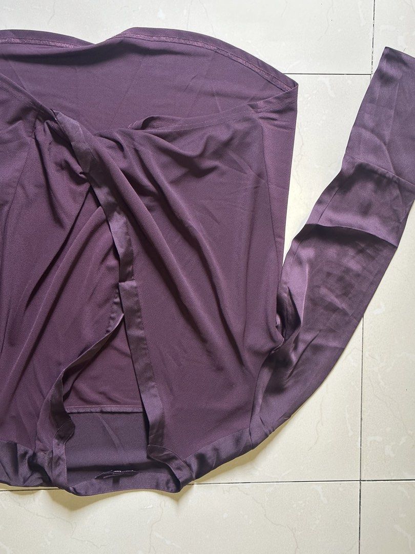 Next Purple Long Sleeve Blouse Size 12 (Category: Longsleeves) located in Manila. Submitted by lisainthesun (Listing ID 1469960053, Image 1). Description: - Brand: Next - Size: 12 - Color: Purple - Material: Smooth fabric with satin-trimmed edges - Design: Wrap front with twist detail and structured cuffs - Condition: Clean, smoke-free home, ready to wear.