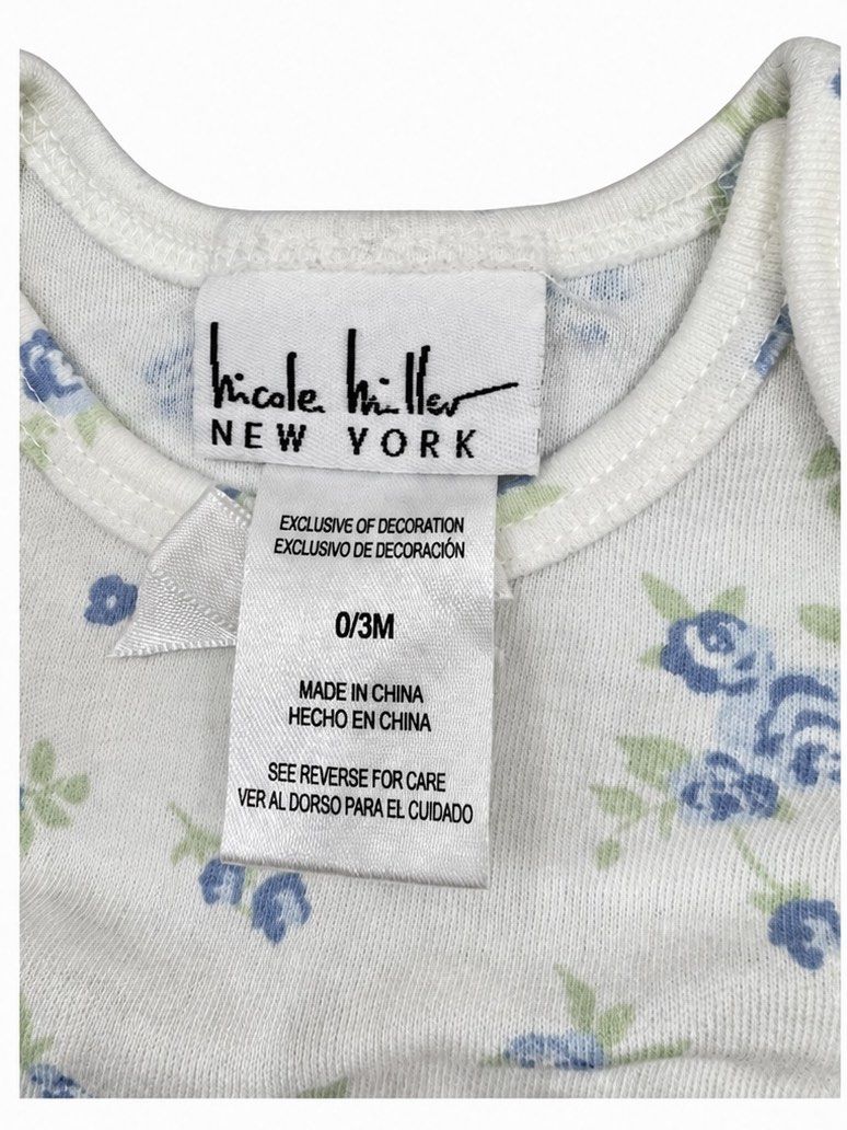 Nicole Miller Onesie (0-3M) (Category: Babies & Kids Fashion) located in Angeles City. Submitted by aeapreloved (Listing ID 1469950362, Image 2). Description: 🌸 Nicole Miller New York Floral Baby Bodysuit ✨ Short sleeves with gathered shoulders ✨ Soft, lightweight fabric ✨ Snap-button closure for easy diaper changes ✨ Sweet floral design, perfect for everyday wear 📏 Size: 0–3 months .