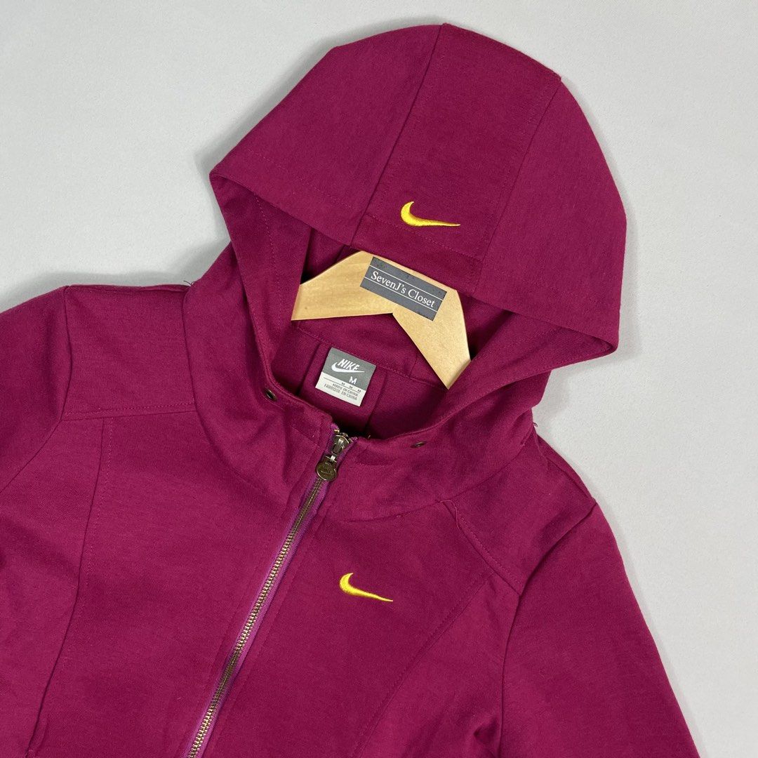 NIKE | Maroon Zip-Up Hoodie (Category: Coats, Jackets and Outerwear) located in Manila. Submitted by sevenjscloset (Listing ID 1470001904, Image 2). Description: - Brand/Style: Authentic Maroon Nike Zip-Up Hoodie - Details: Yellow embroidered Swoosh logo, zip closure, adjustable drawstring hood, and front pockets - Size on tag: Medium - Actual measurements: 21 inches (length) x 15 inches (width) - Model reference: 5'2" height, 50kg weight - Condi