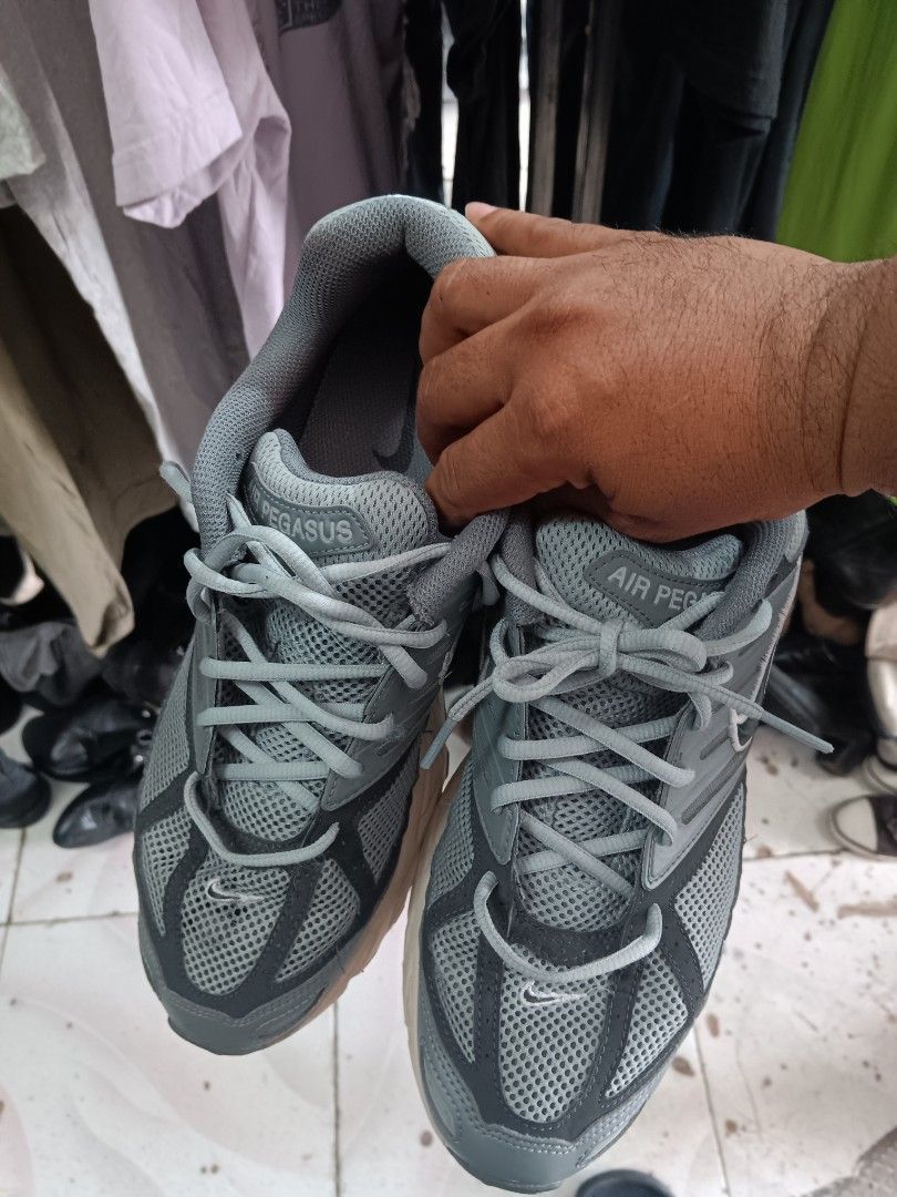 Nike Air Pegasus Sneakers Grey US 11 (Category: Sneakers) located in Cagayan de Oro. Submitted by kokirts17 (Listing ID 1469961263, Image 3). Description: - Brand/Model: Nike Air Pegasus - Colorway: Grey with cream soles - Size: US 11 - Material: Breathable mesh upper - Cushioning: Full-length Nike Air unit for maximum comfort - Condition: Clean outsoles with great traction pattern, ready to wear Nike Air Pegasus 2K5 Light Pumice HOOK UP LANG PO 