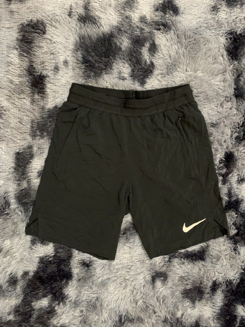 Nike Black running Shorts Size S (Category: Shorts) located in Iba. Submitted by thriftcoyan (Listing ID 1470011510, Image 1). Description: - Brand: Nike - Color: Black - Size: Small (S) -Size 29-31 -Length 18 - Issue cut tag pero may wash tag - Lightweight and breathable fabric - Elastic waistband with adjustable inner drawstring - Secure zippered side pockets - Printed Nike swoosh logo near the bottom hem - Ideal for running, gym workouts, and 