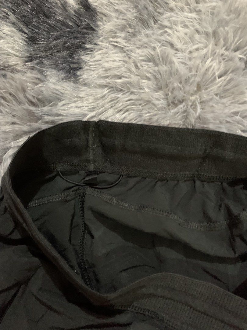 Nike Black running Shorts Size S (Category: Shorts) located in Iba. Submitted by thriftcoyan (Listing ID 1470011510, Image 3). Description: - Brand: Nike - Color: Black - Size: Small (S) -Size 29-31 -Length 18 - Issue cut tag pero may wash tag - Lightweight and breathable fabric - Elastic waistband with adjustable inner drawstring - Secure zippered side pockets - Printed Nike swoosh logo near the bottom hem - Ideal for running, gym workouts, and 