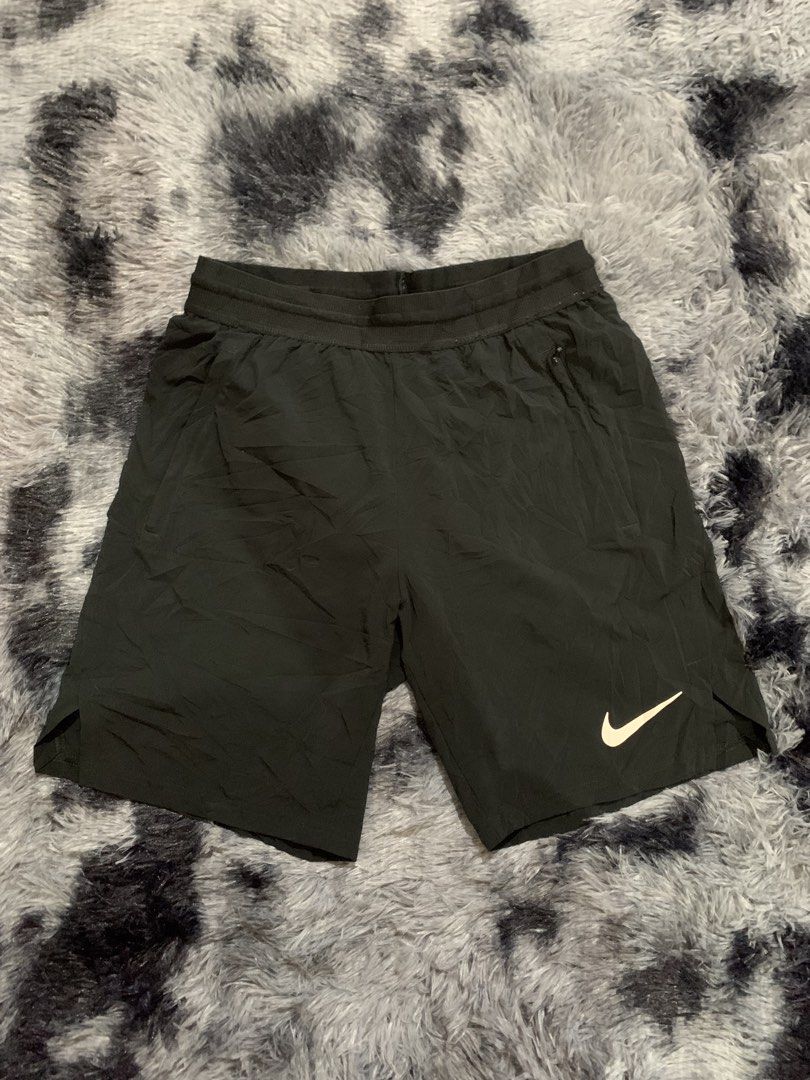 Nike Black running Shorts Size S (Category: Shorts) located in Iba. Submitted by thriftcoyan (Listing ID 1470011510, Image 2). Description: - Brand: Nike - Color: Black - Size: Small (S) -Size 29-31 -Length 18 - Issue cut tag pero may wash tag - Lightweight and breathable fabric - Elastic waistband with adjustable inner drawstring - Secure zippered side pockets - Printed Nike swoosh logo near the bottom hem - Ideal for running, gym workouts, and 