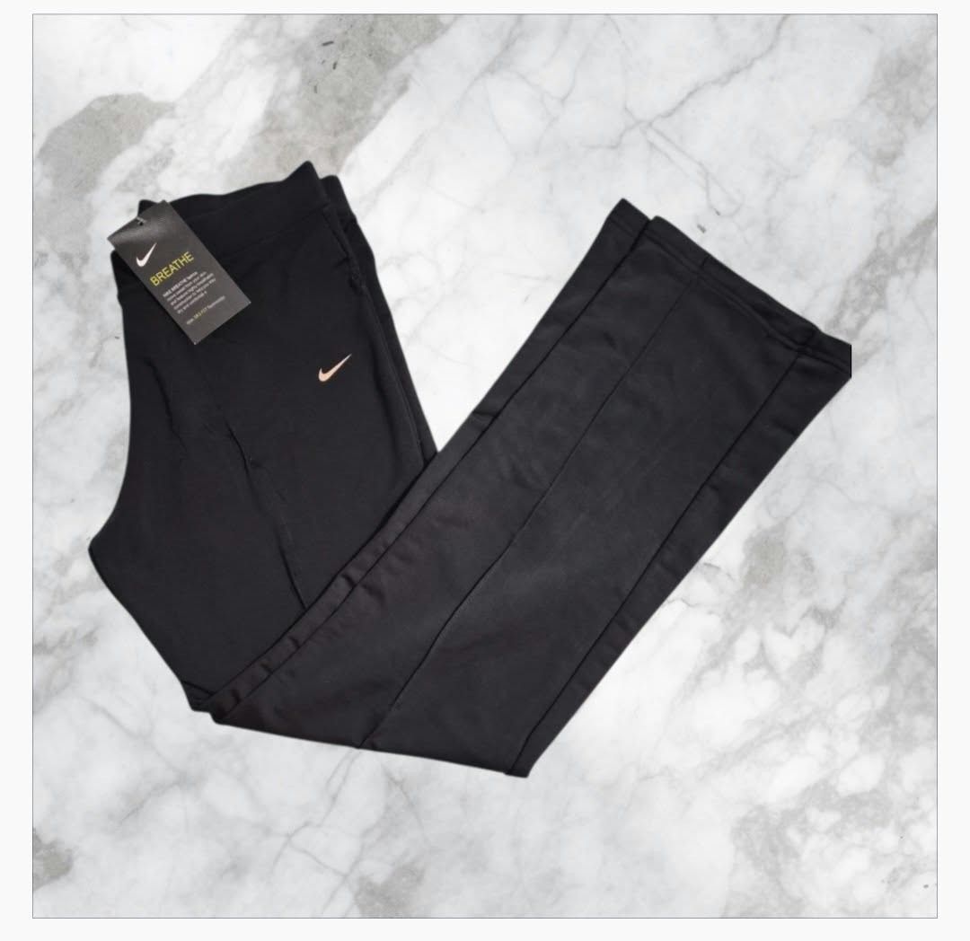 Nike Breathe Black Active Pants with Tags (Category: Joggers) located in Paranaque City. Submitted by calm_youngstore7 (Listing ID 1469966201, Image 2). Description: 70% OFF RETAIL! - Brand new with original store tags - Authentic Black Nike athletic pants - Built-in Breathe technology for ultimate comfort - Embroidered small Swoosh logo near the hip - Flattering flared cut with stylish front center seam detailing - Clean, solid black back design