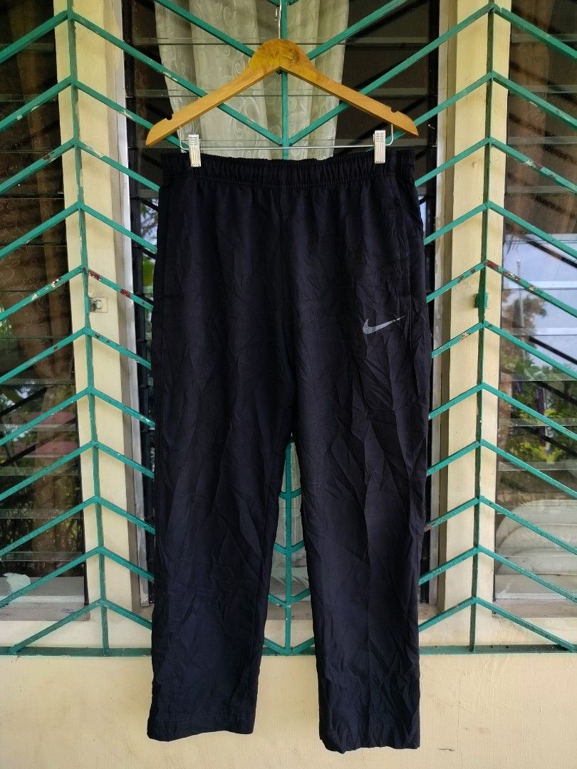 Nike Dri-FIT Black Track Pants Size XL (Category: Joggers) located in Manila. Submitted by virgiliosa38485 (Listing ID 1469997270, Image 1). Description: - Brand: Nike - Item: Dri-FIT Track Pants - Color: Black with Silver Swoosh logo on left leg - Size: XL -Waist 30-40 -Length 40 -Leg Opening /Hem 8 - Material: Dri-FIT (moisture-wicking, keeps you dry) - Fit: Comfortable elastic waistband - Origin: Made in Indonesia - Care: Machine washable - Co