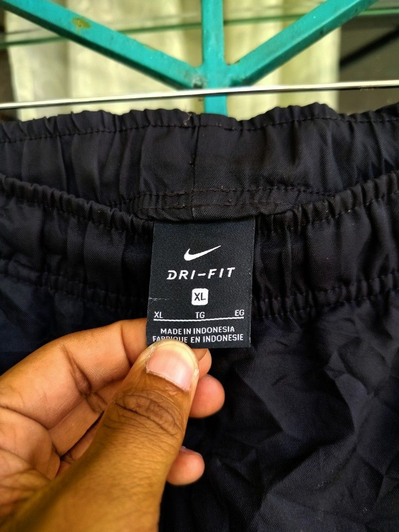 Nike Dri-FIT Black Track Pants Size XL (Category: Joggers) located in Manila. Submitted by virgiliosa38485 (Listing ID 1469997270, Image 3). Description: - Brand: Nike - Item: Dri-FIT Track Pants - Color: Black with Silver Swoosh logo on left leg - Size: XL -Waist 30-40 -Length 40 -Leg Opening /Hem 8 - Material: Dri-FIT (moisture-wicking, keeps you dry) - Fit: Comfortable elastic waistband - Origin: Made in Indonesia - Care: Machine washable - Co
