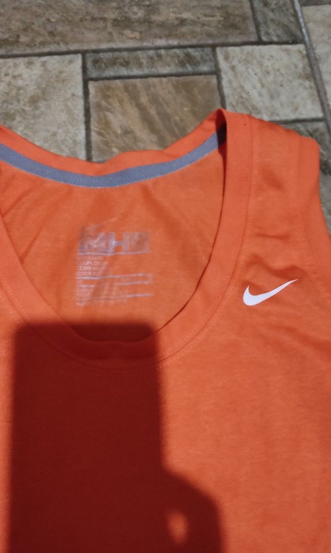 Nike Drifit Orange top (Category: Activewear) located in Mangatarem. Submitted by itsumo_kokoro (Listing ID 1470012950, Image 2). Description: Size: XS - S.