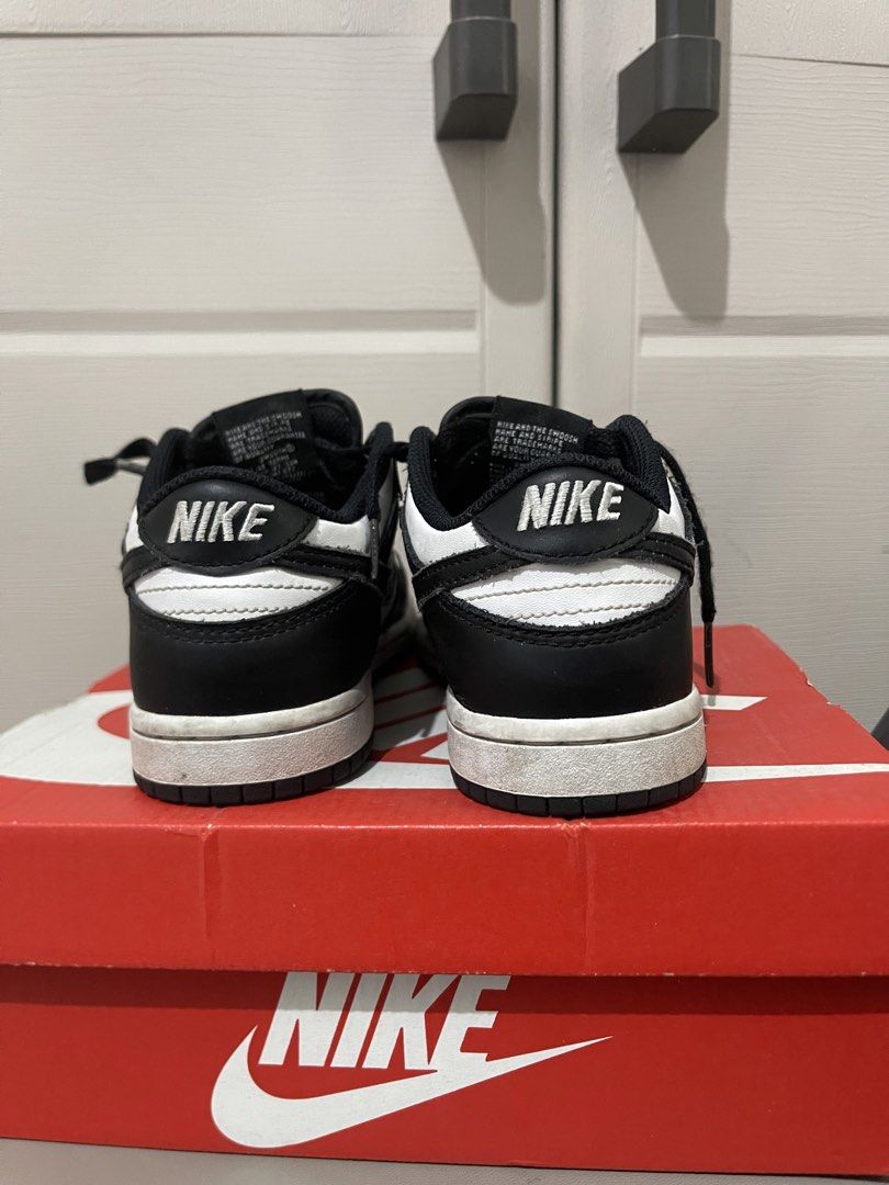 Nike Dunk Low Panda (PS) Size 13C (Category: Babies & Kids Fashion) located in Quezon City. Submitted by preloveditemcollection (Listing ID 1469976335, Image 3). Description: - Item: Nike Dunk Low PS (Preschool) - Colorway: Black and White (Panda) - Style Code: CW1588-100 - Condition: Clean uppers with minor creasing, regular wear on midsoles and outsoles - Inclusions: Original box included - Features: Versatile everyday kicks ideal for school or