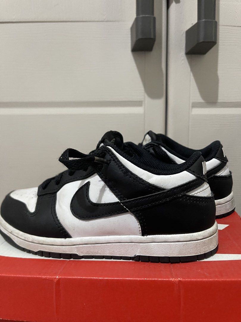 Nike Dunk Low Panda (PS) Size 13C (Category: Babies & Kids Fashion) located in Quezon City. Submitted by preloveditemcollection (Listing ID 1469976335, Image 2). Description: - Item: Nike Dunk Low PS (Preschool) - Colorway: Black and White (Panda) - Style Code: CW1588-100 - Condition: Clean uppers with minor creasing, regular wear on midsoles and outsoles - Inclusions: Original box included - Features: Versatile everyday kicks ideal for school or