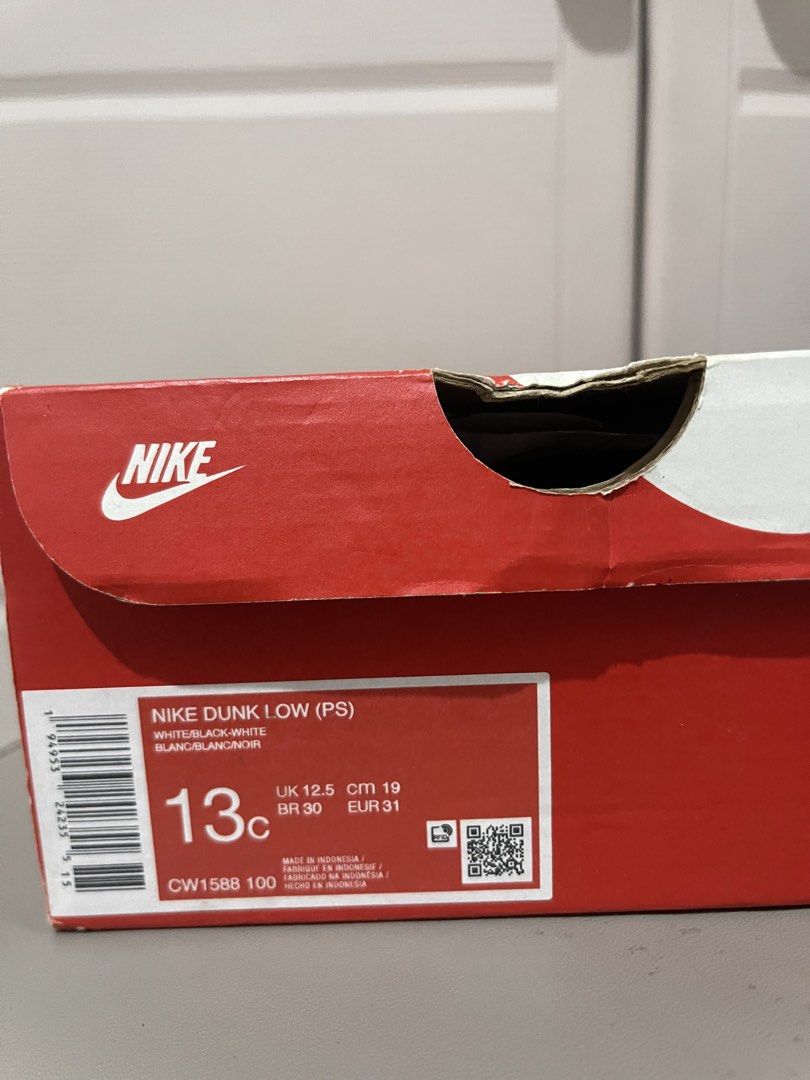 Nike Dunk Low Panda (PS) Size 13C (Category: Babies & Kids Fashion) located in Quezon City. Submitted by preloveditemcollection (Listing ID 1469976335, Image 1). Description: - Item: Nike Dunk Low PS (Preschool) - Colorway: Black and White (Panda) - Style Code: CW1588-100 - Condition: Clean uppers with minor creasing, regular wear on midsoles and outsoles - Inclusions: Original box included - Features: Versatile everyday kicks ideal for school or