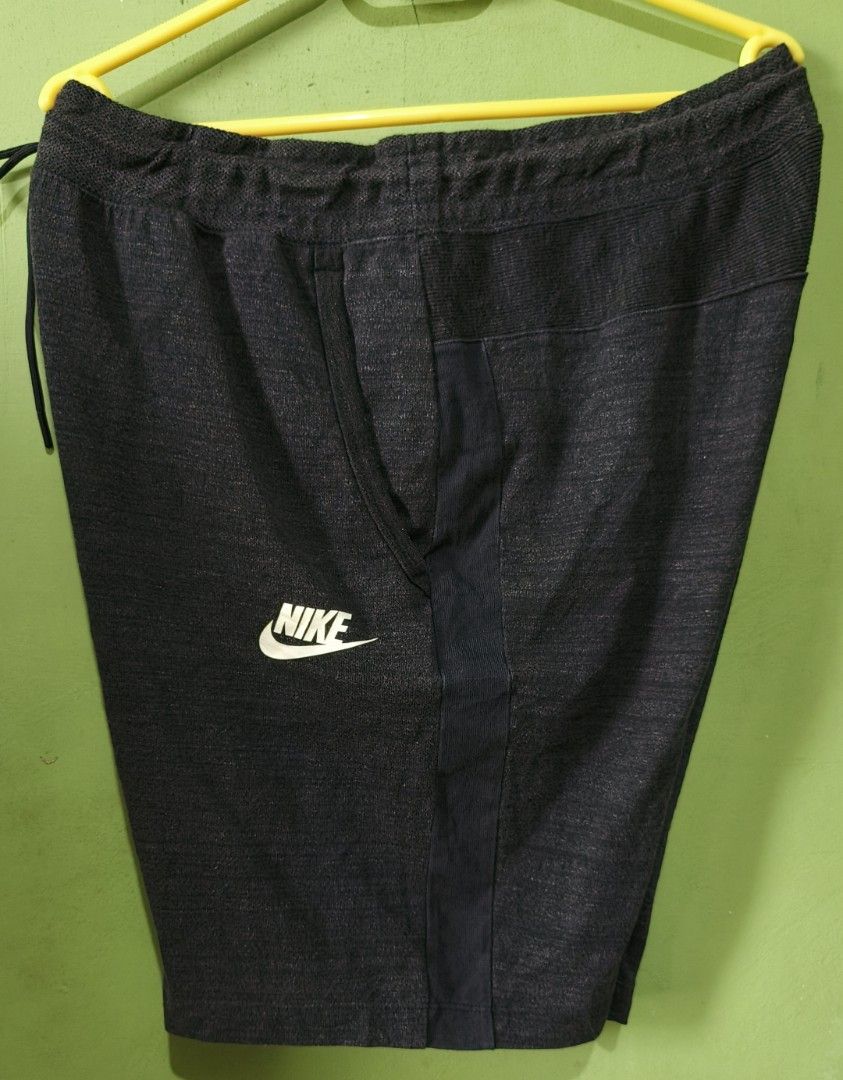 Nike Gray Drawstring Athletic Shorts (Category: Shorts) located in Aborlan. Submitted by tonsky_thrift (Listing ID 1470006146, Image 3). Description: ‎📌 Size: 2xl on tag ‎📌 Dimes: waistline 35-40 length 20 ‎📌 Colorate: 9/10 ‎📌 excellent condition ‎📌 Issue:none - Authentic Nike gray athletic shorts - Adjustable drawstring waistband for a custom fit - Secure zippered side pocket for your essentials - Contrasting dark side panels and white Nike