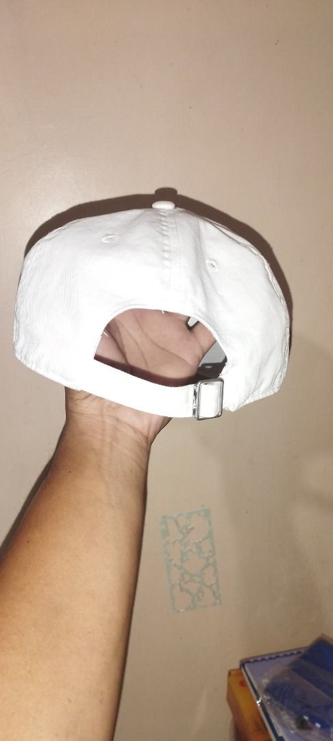 Nike Heritage86 White Cap (Category: Caps & Hats) located in Koronadal. Submitted by jrdar (Listing ID 1470138721, Image 3). Description: - Brand: Nike - Model: Heritage86 Cap - Color: White with dark navy blue embroidered script logo - Design: Classic curved brim with structured front panels and branded interior taping - Closure: Adjustable metal strap for a custom fit - Condition: Brand new / Excellent daily wear staple.