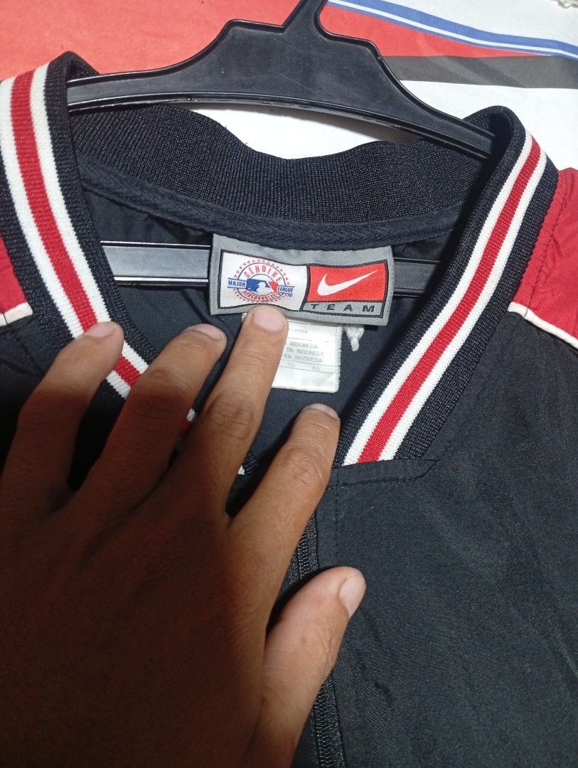 Nike Men's Red and Black Jacket (Category: Coats, Jackets and Outerwear) located in Davao. Submitted by psycho_oblak13 (Listing ID 1470097227, Image 2). Description: .
