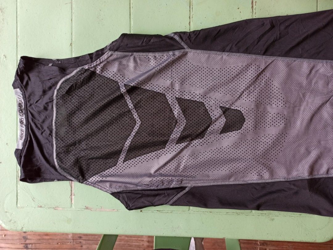 Nike Pro Combat Hypercool Men's Athletic Tank Top Black (Category: Activewear) located in Tagbilaran City. Submitted by delasierra39181 (Listing ID 1470065140, Image 2). Description: - Brand: Nike Pro Combat - Style: Hypercool athletic tank top - Color: Black - Features: Breathable mesh back panels for maximum ventilation, sleeveless fit, and classic Nike swoosh logo - Ideal for: Training, running, gym workouts, and sports.