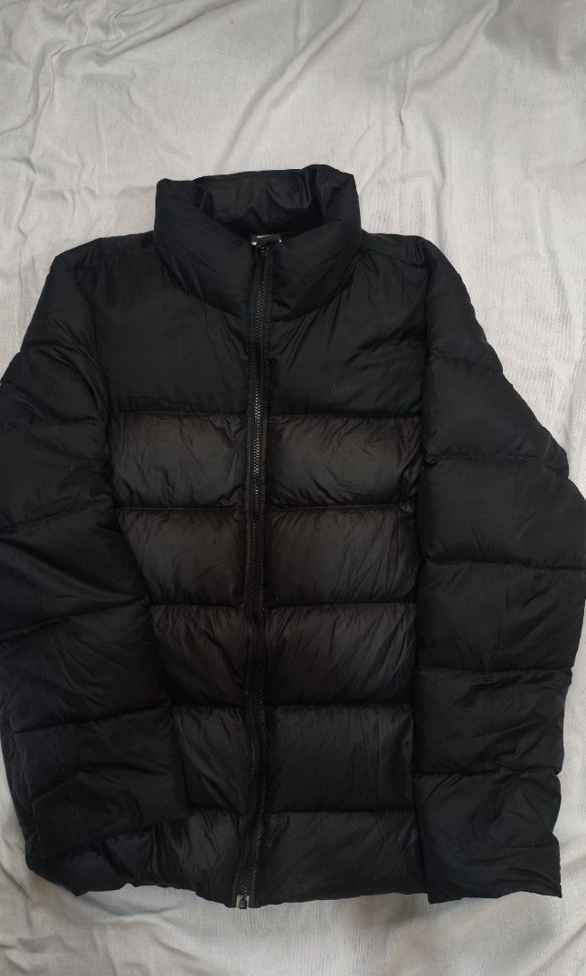 Nike Puffer Jacket (Category: Coats, Jackets and Outerwear) located in Baguio. Submitted by utoljay__ (Listing ID 1470113436, Image 1). Description: Nike Puffer Jacket - Size XL on tag, dm for more info - Minimal issues - Last price for sure buyers - Will deliver around Baguio - Outside Baguio will be shipped + DF.