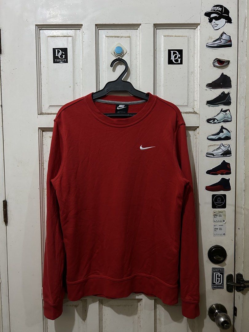 Nike Red Crewneck Sweatshirt (Category: Coats, Jackets and Outerwear) located in Pasay City. Submitted by deguzmanjay (Listing ID 1470069792, Image 1). Description: - Color: Bright red - Brand: Nike - Fit: Regular fit, comfortable cotton blend - Design: Long sleeves, ribbed cuffs, classic crew neckline with grey inner lining - Branding: Small white embroidered Nike swoosh on left chest - Condition: Clean solid color design, very easy to match wit