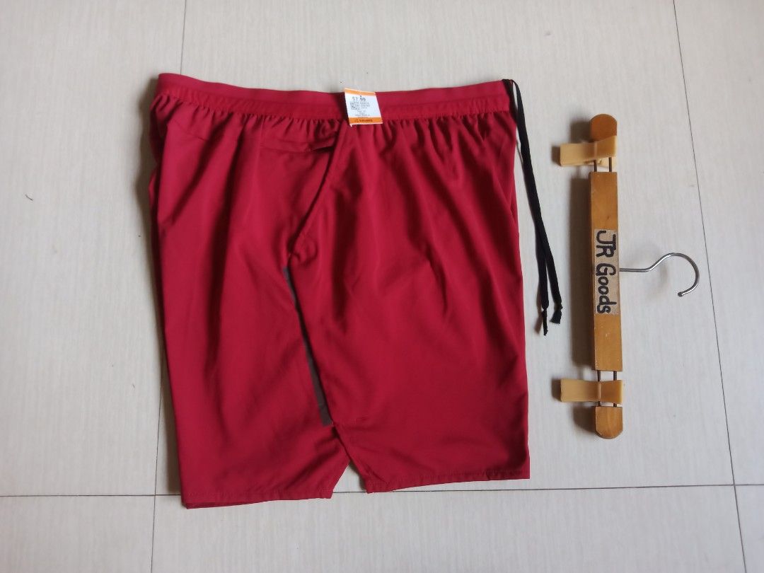 Nike Red Running Shorts (Category: Activewear) located in Tanay. Submitted by jrgoods (Listing ID 1470011803, Image 3). Description: Nlke dri-fit short XL fits large men's Above the knee Waistline 32-36 length 17.5 Good as new condition 750+ship Tanay Rizal location Shipping Nationwide - Condition: Brand new with store tags attached - Color: Red with black drawstrings - Features: Reflective silver Nike swoosh for visibility - Pocket: Convenient z