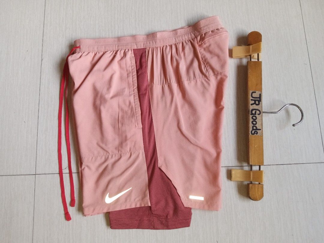 Nike Running Division 2-in-1 Shorts (Category: Activewear) located in Tanay. Submitted by jrgoods (Listing ID 1470085723, Image 1). Description: Nike Running Division shorts w/ cycling Small men's Waistline 26-30 Length 14.5 Good as new condition 699+ship Tanay Rizal location Shipping Nationwide - 2-in-1 design with a comfortable built-in compression liner - Elastic waistband with 'Nike Running' branding and adjustable red drawstring - Convenient