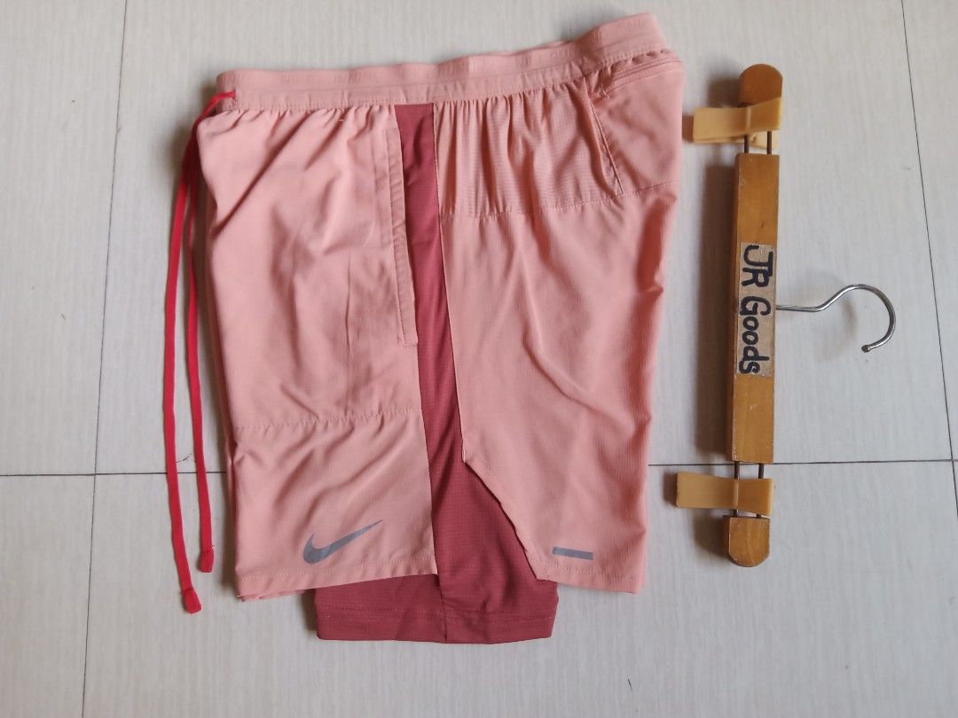 Nike Running Division 2-in-1 Shorts (Category: Activewear) located in Tanay. Submitted by jrgoods (Listing ID 1470085723, Image 2). Description: Nike Running Division shorts w/ cycling Small men's Waistline 26-30 Length 14.5 Good as new condition 699+ship Tanay Rizal location Shipping Nationwide - 2-in-1 design with a comfortable built-in compression liner - Elastic waistband with 'Nike Running' branding and adjustable red drawstring - Convenient