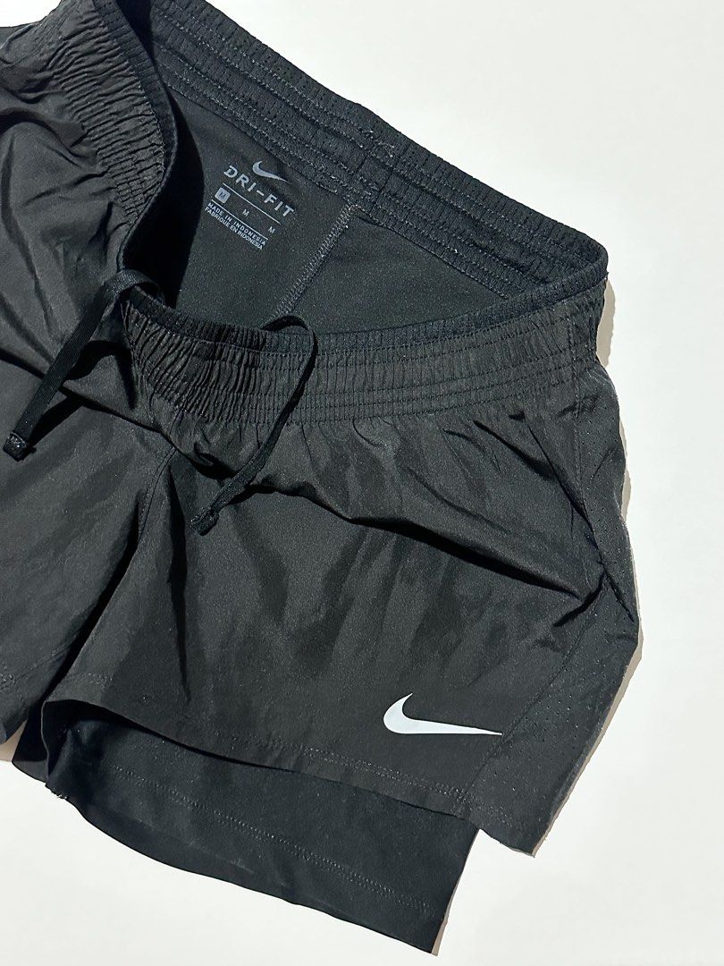 Nike Running Short (Category: Activewear) located in Manila. Submitted by reclaimed.shop (Listing ID 1470110382, Image 2). Description: Measurements (laid flat): 📏 Width: 28-34” 📏 Length: 13” 📩 DM us to claim or inquire for more details! Thank you!.