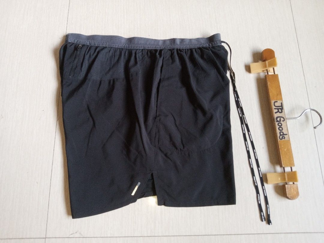 Nike Running Shorts Black (Category: Activewear) located in Tanay. Submitted by jrgoods (Listing ID 1470091008, Image 3). Description: Nlke running Fits medium to Large men's above the knee Waistline 32-34 Length 16 Excellent to new condition 599+ship Tanay Rizal location Shipping Nationwide - Color: Black with grey waistband and branded drawstring - Condition: Good, clean stitching - Features: Reflective swoosh logo for visibility - Storage: Sid