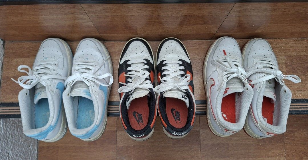 Nike Sneakers Bundle - Air Force 1 & Dunk (Category: Sneakers) located in Las Pinas. Submitted by _niksss (Listing ID 1469953608, Image 1). Description: - Bundle includes 3 pairs of Nike sneakers - Colorways: Light Blue/White AF1s, Orange/Black Dunks, Orange/White AF1s - Condition: A little dirty since hindi na nagagamit, lightly yellowing in midsoles, and No sole seps. Very good condition overall - Selling all three pairs together as a bundle se