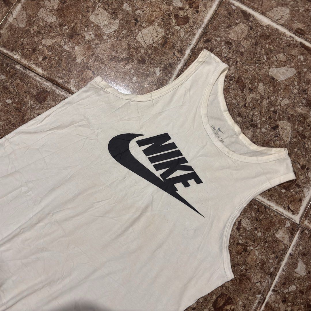 Nike Tank Tops (Category: Activewear) located in Manila. Submitted by loydgani (Listing ID 1470035572, Image 2). Description: Size: (L) Length: 30 Width: 22 Issue: need wash The color may vary due to lightning. 400 + sf 📦Jnt 📍Cebu .