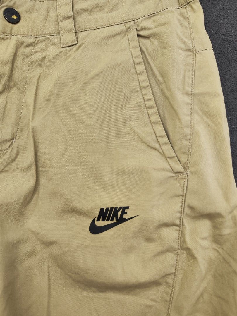 Nike Tech Nylon Beige Shorts (Category: Shorts) located in Bulacan. Submitted by emilj23 (Listing ID 1469966138, Image 2). Description: Nike Tech Nylon Beige Shorts Size M on tag L 20 W 32 Leg Hole 9 Condition 9/10 Color rate 9.5/10 Issue Minimal Stains Pinholes.