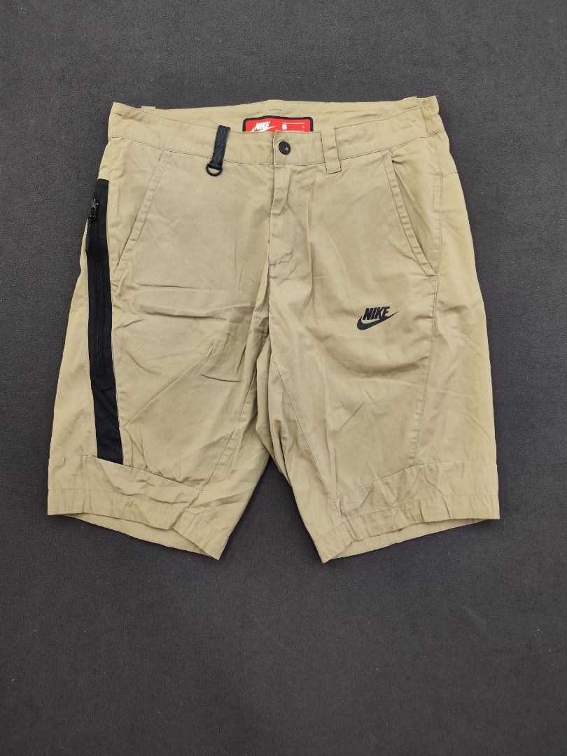 Nike Tech Nylon Beige Shorts (Category: Shorts) located in Bulacan. Submitted by emilj23 (Listing ID 1469966138, Image 1). Description: Nike Tech Nylon Beige Shorts Size M on tag L 20 W 32 Leg Hole 9 Condition 9/10 Color rate 9.5/10 Issue Minimal Stains Pinholes.