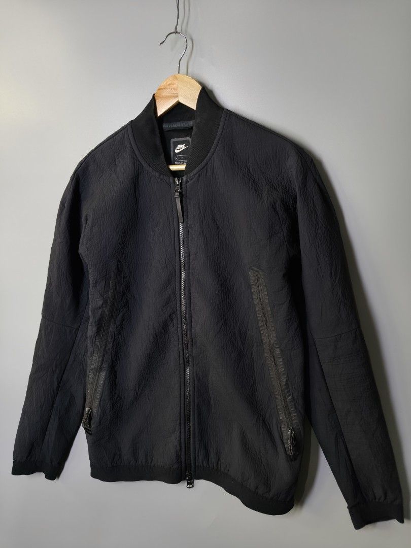 Nike Tech Pack Bomber (Category: Coats, Jackets and Outerwear) located in Baguio. Submitted by modern6tone6 (Listing ID 1470029436, Image 2). Description: Excellent Condition 9.5/10 color rate Medium on tag 21 Width 27 Length.